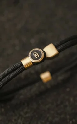 Steel & Barnett - Zwart/goud Armband